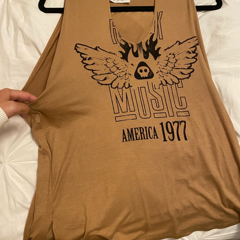 A sadie & sage rock and roll top.